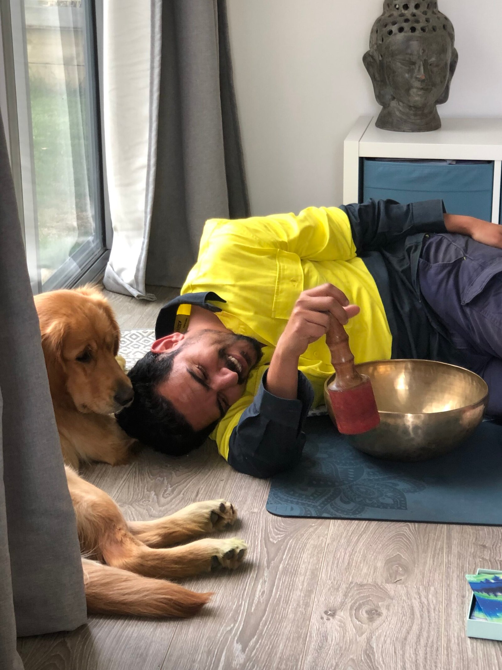 a photo of mukesh and his dog in his pod